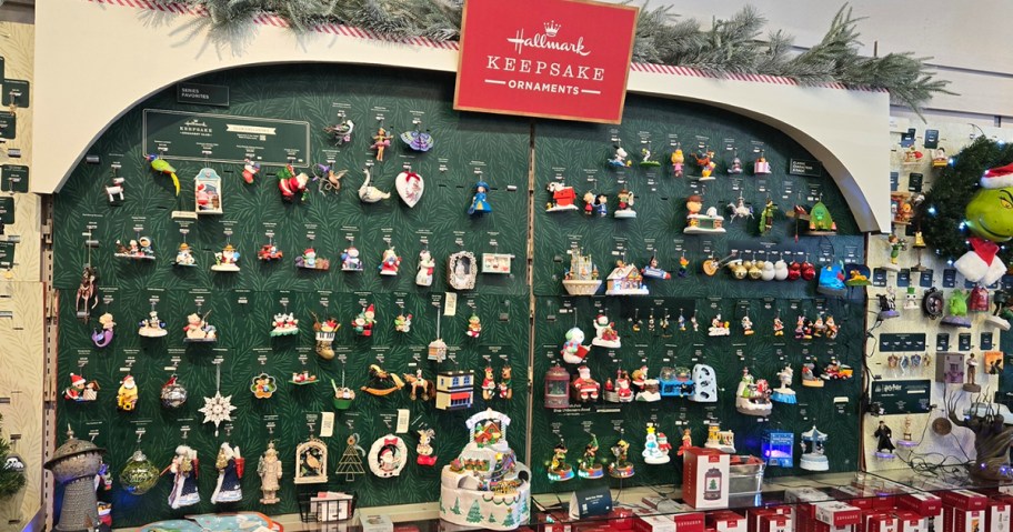 hallmark keepsake ornaments hanging on display in store