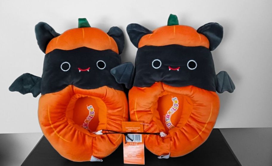 a pair of bat squishmallows halloween slippers