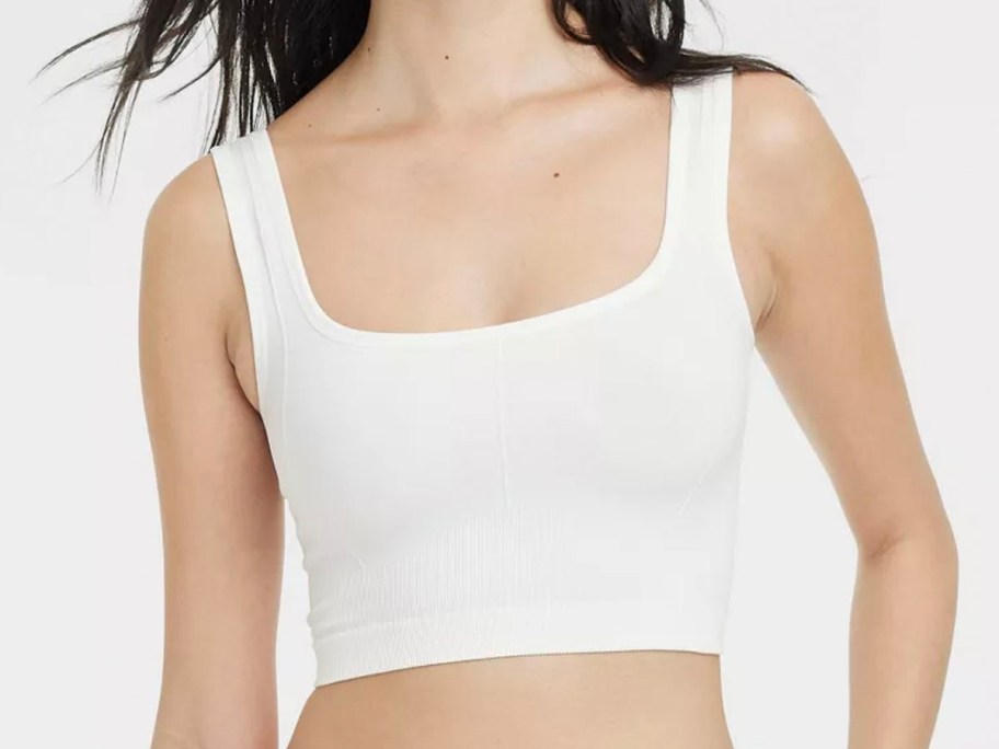 girl wearing white brami 
