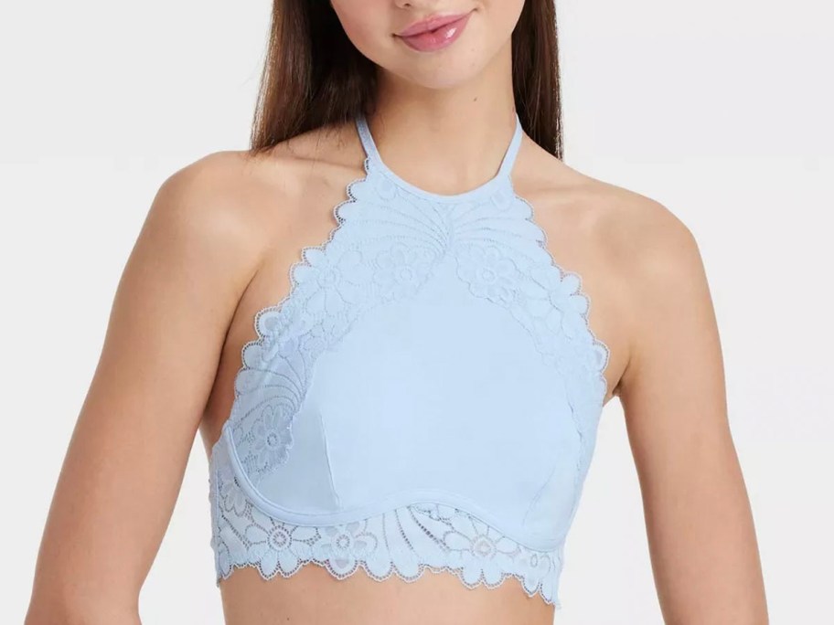 girl wearing blue crochette bralette 