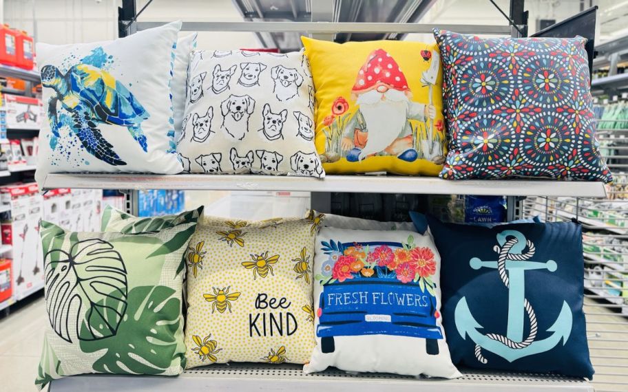assorted throw pillows on a walmart aisle endcap
