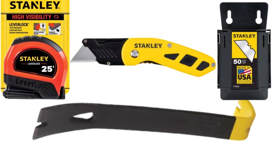 a red Stanley tape measure in the package, a yellow Stanley box cutter knife, a pack of extra razor blades, a Stanley small crow bar