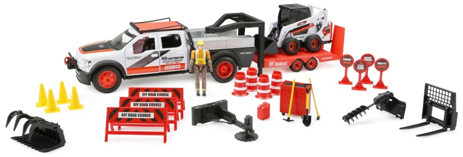 ford truck and bobcat vehicle with construction accessories
