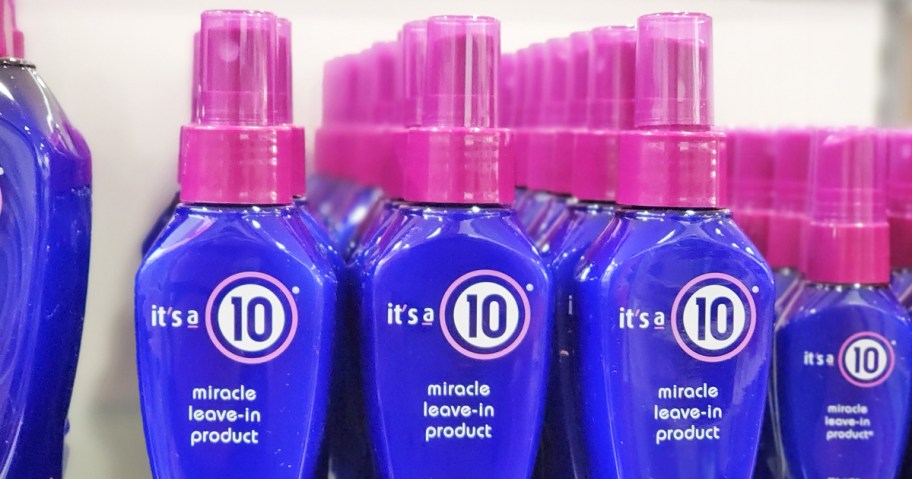 blue and purple bottles of It's a 10 Miracle Leave-In on store shelf