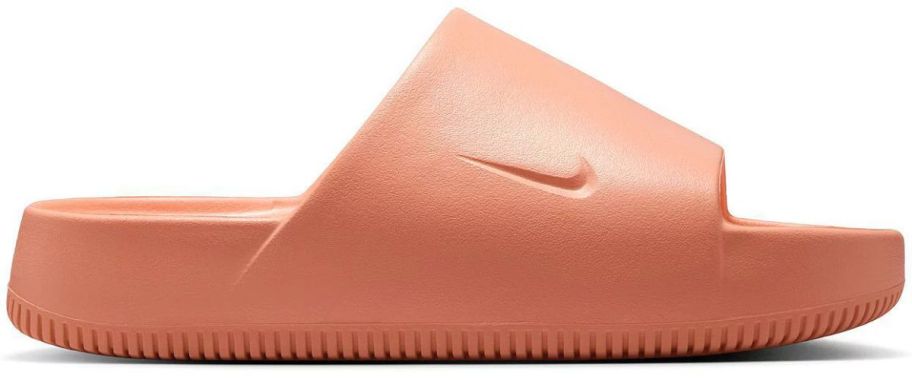 An orange Nike SLide