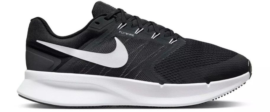 A pair of black and white Nike shoes