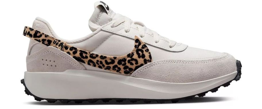 A white and animal print Nike Waffle Debut shoe