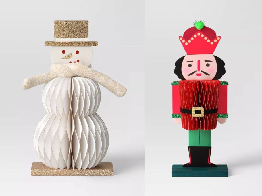 Wondershop Honeycomb Christmas Decorative snowman and Nutcracker stock images
