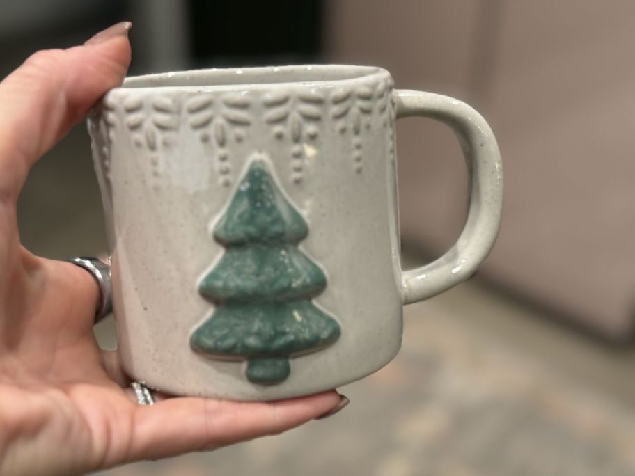 World Market Christmas Tree Ceramic Mug in hand