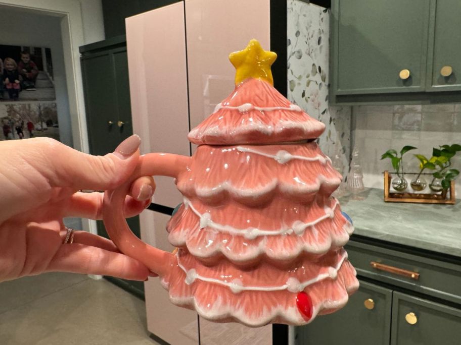 World Market Pink Christmas Tree Lidded Ceramic Mug in hand