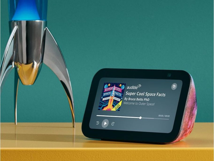 amazon echo show 5 kids on desk next to lamp