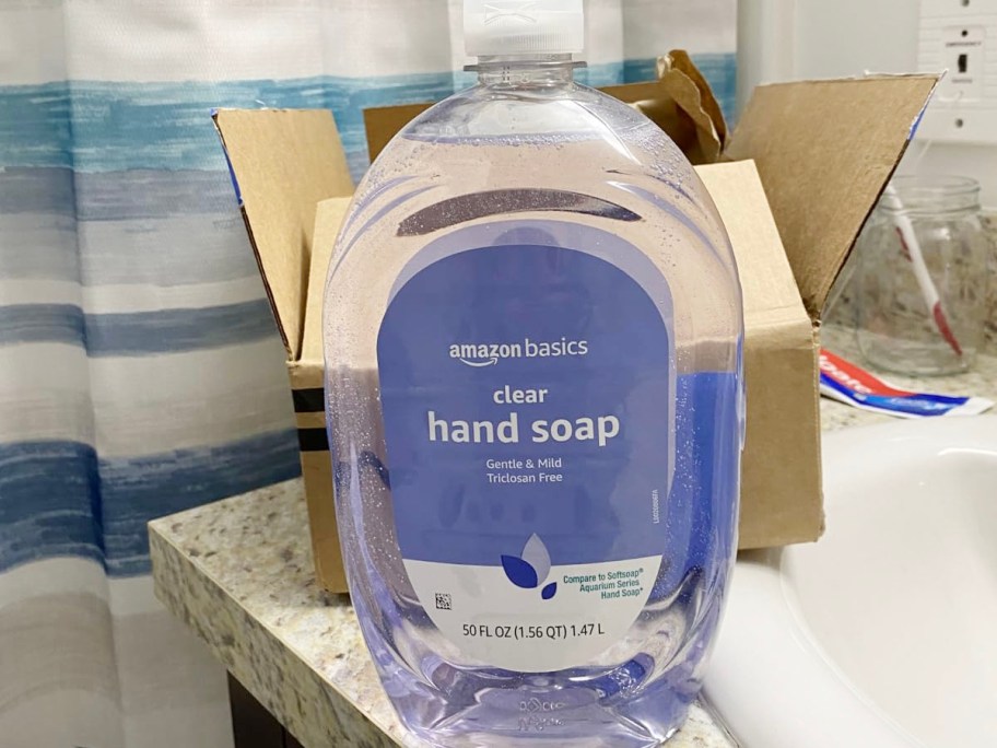 large bottle of hand soap on bathroom counter 