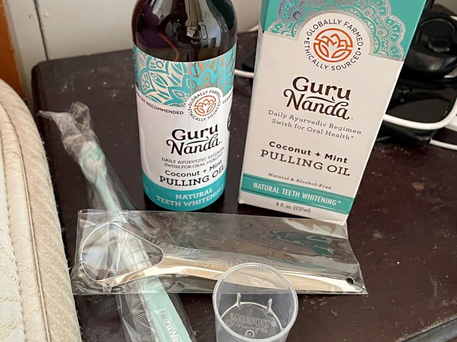 guru nanda pulling oil kit on table