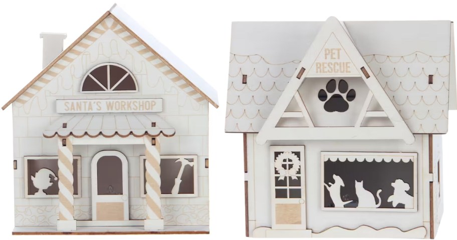 wooden craft holiday houses, a Santa's Workshop and a Pet Rescue