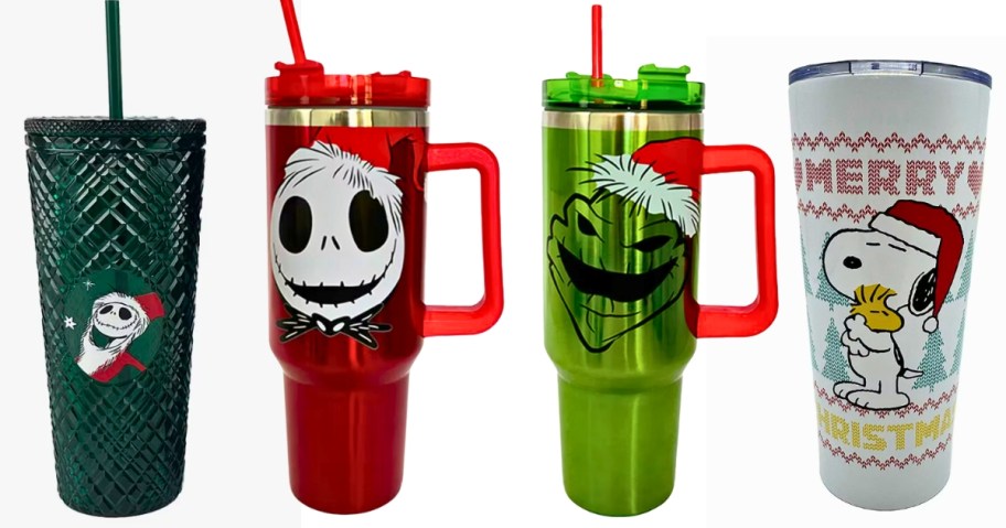 a green plastic tumbler with straw and red stainless steel tumbler with handle, and a featuring Jack from Nightmare Before Christmas, a green stainless steel tumbler with handle featuring Oogie Boogie from Nightmare Before Christmas, and a white stainless steel coffee tumbler with Snoopy and Woodstock with Snoopy wearing a Santa Hat
