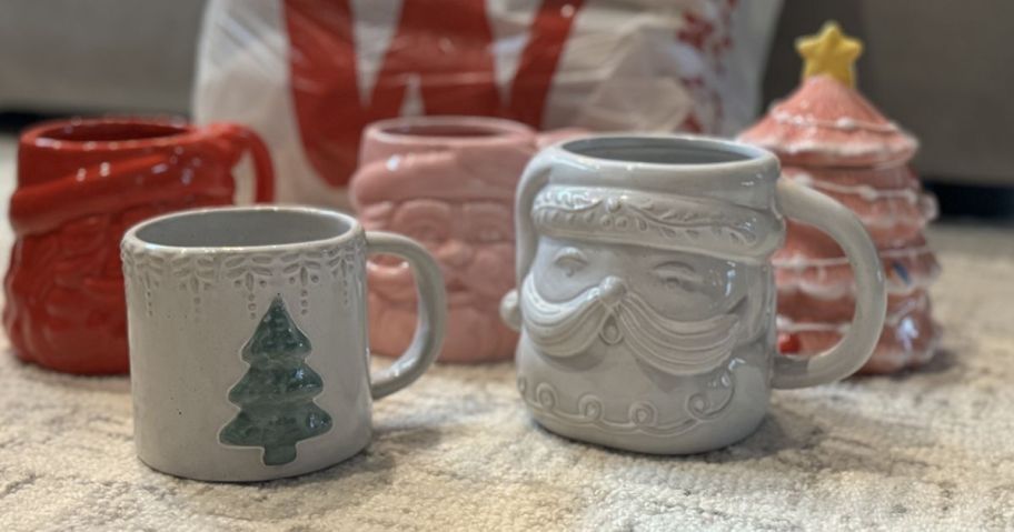 world market mugs on rug