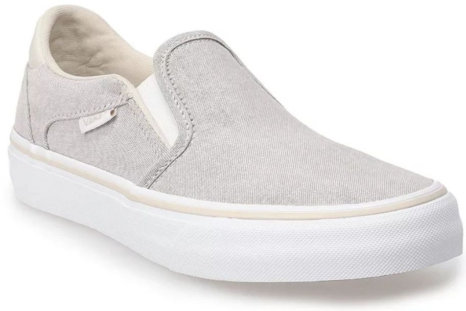 A tan Vans women's slip on shoe