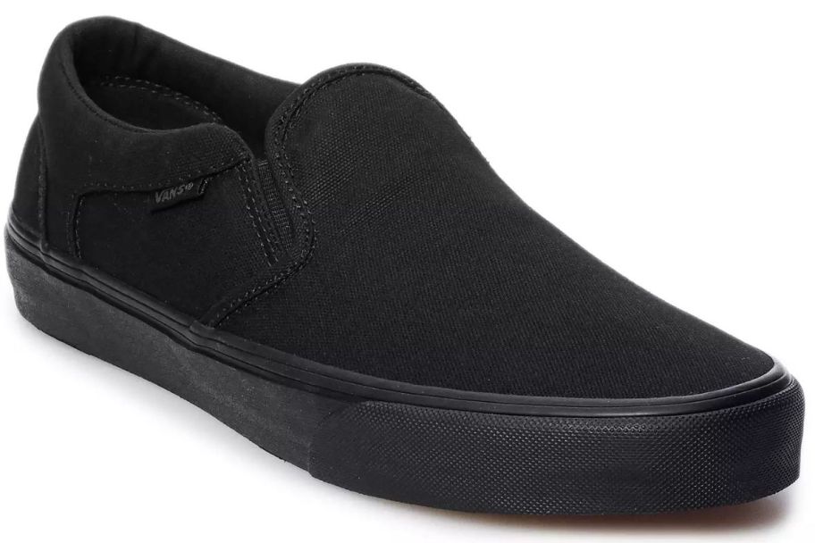 A black Vans slip on shoe