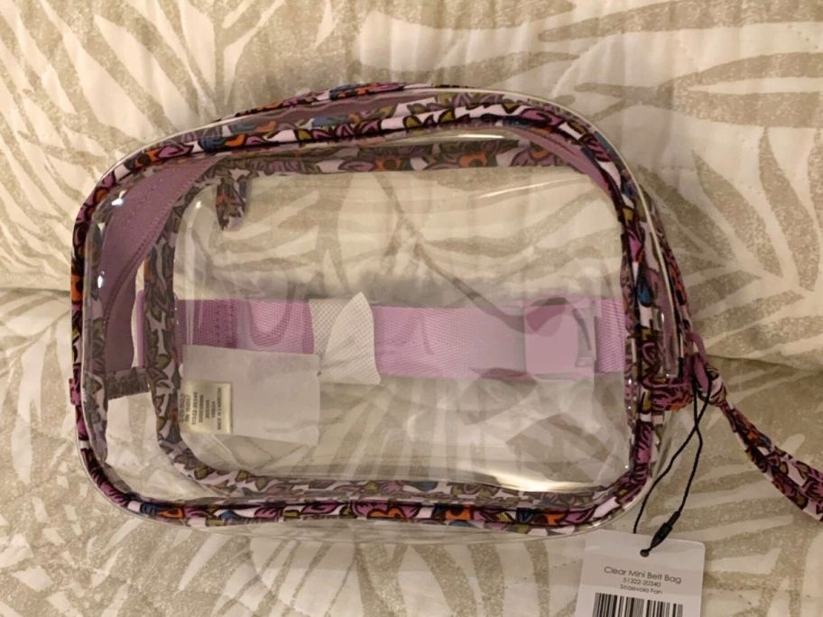 Vera Bradley Outlet Clear Mini Belt Bag o a bed