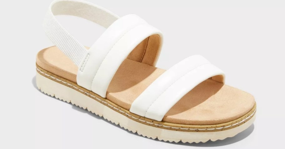 a girls white and tan sandal