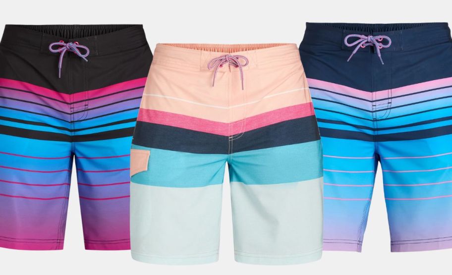 three pair of mens swim trunks in assorted designs