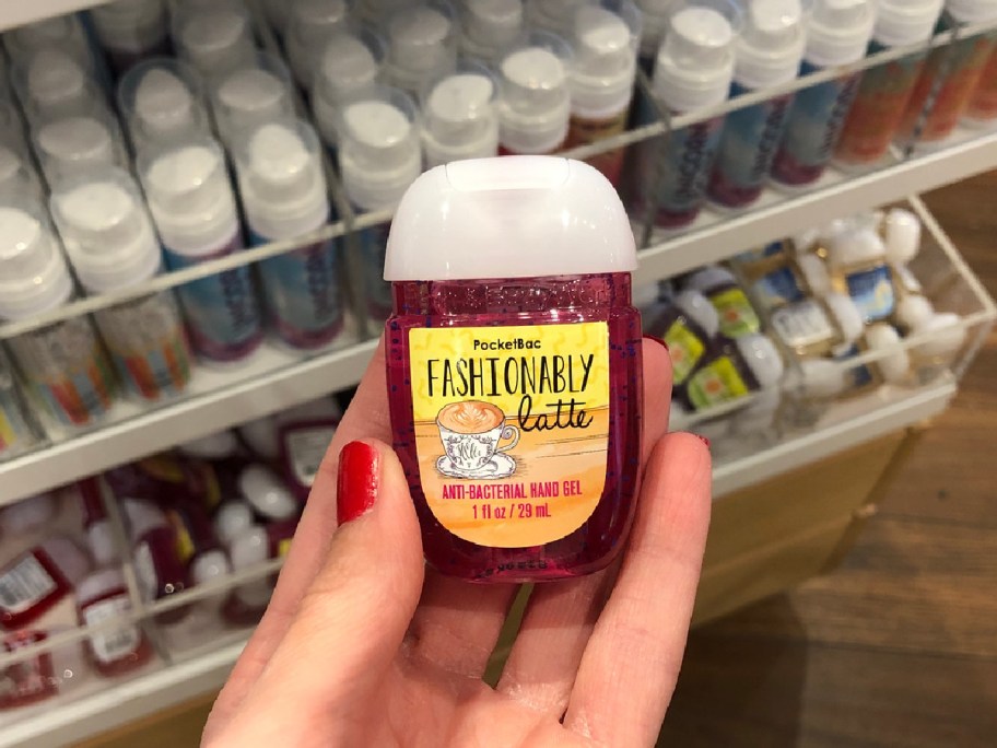 hand holding bath & body works hand sanitizer
