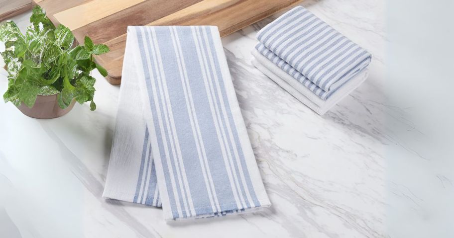 blue and white better homes and gardens kitchen towels on counter