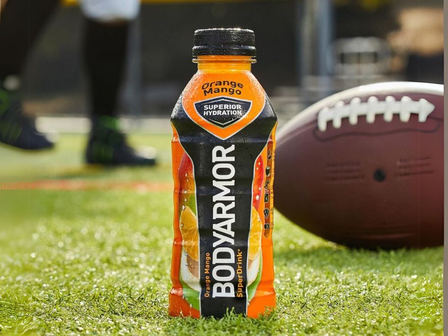 BodyArmor Sports Drink 20oz bottle on football field