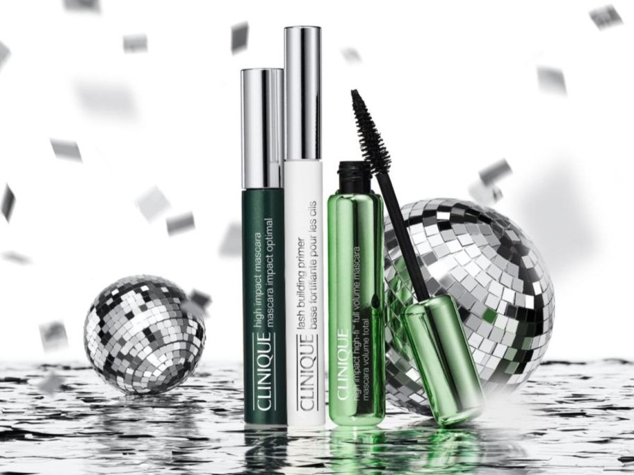 Clinique High Impact Lash Line-Up Makeup Set with disco balls behind it