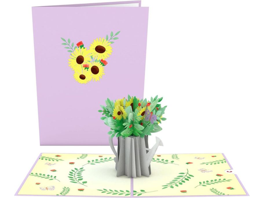 A 3-d popup card of a flower bouquet in a watering can