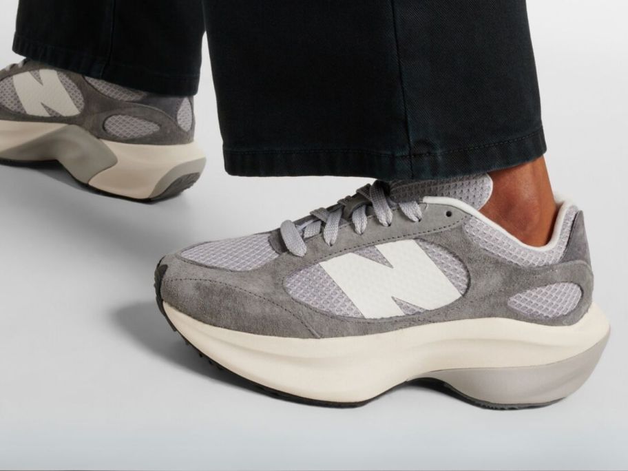 woman wearing New Balance Women's WRPD Runner Shoes