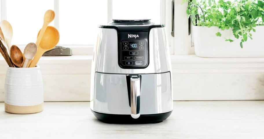 white and black ninja air fryer on kitchen counter