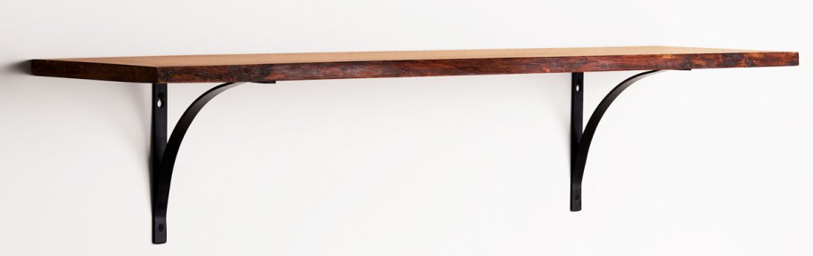 wood wall shelf with black brackets 
