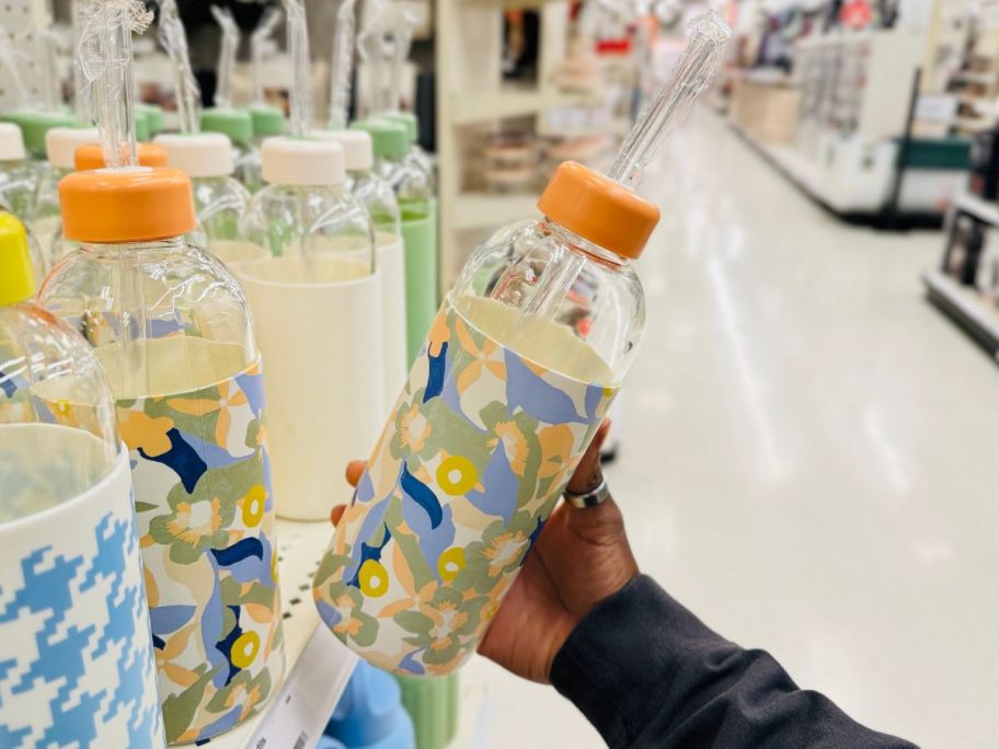 Room Essentials 24oz Straw Tumbler - Floral in hand in store