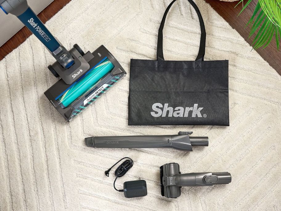Shark PowerDetect Cordless Stick Vacuum w/ Tools with tools on carpet