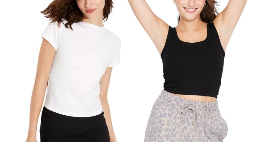 A woman wearing a white T-shirt and another wearing a black tank