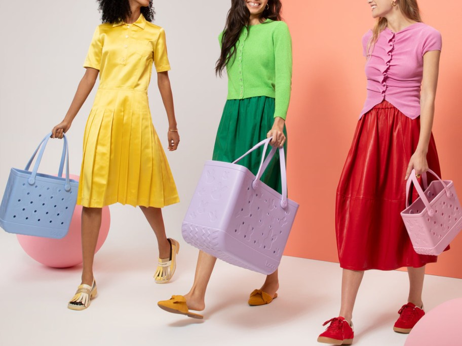 Women swinging their easter Bogg bag collection in different color