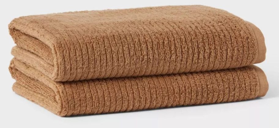 two brown Threshold Quick-Dry Ribbed Towels stacked on top of each other