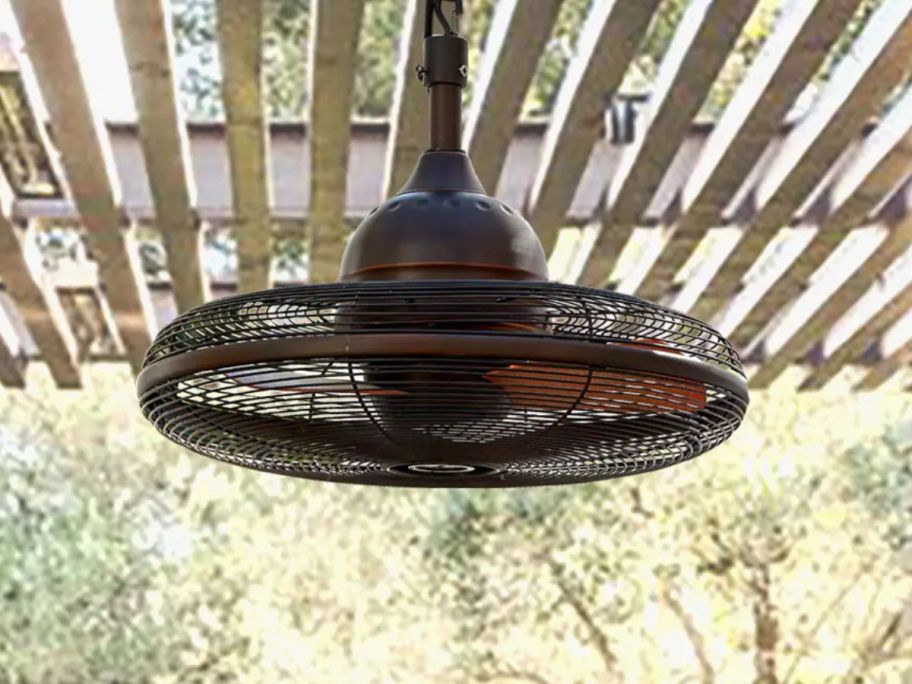 Oil Rubbed Bronze Harbor Breeze Valdosta 20" Ceiling Fan hanging over patio