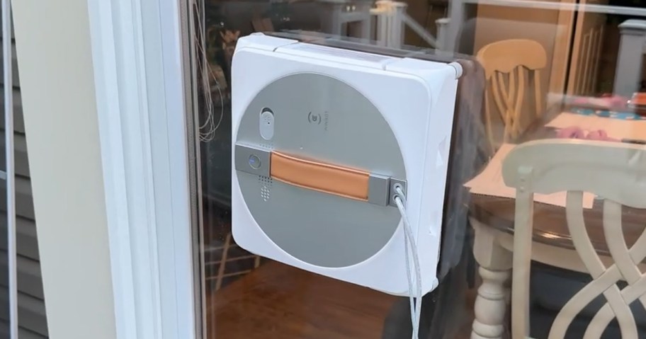 ecovacs window cleaning robot cleaning a window