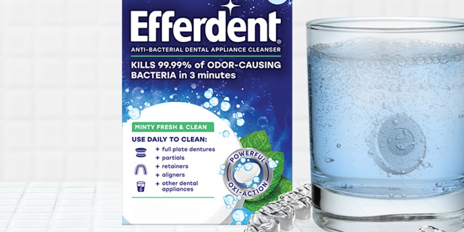 efferdent tablets box next to glass of water