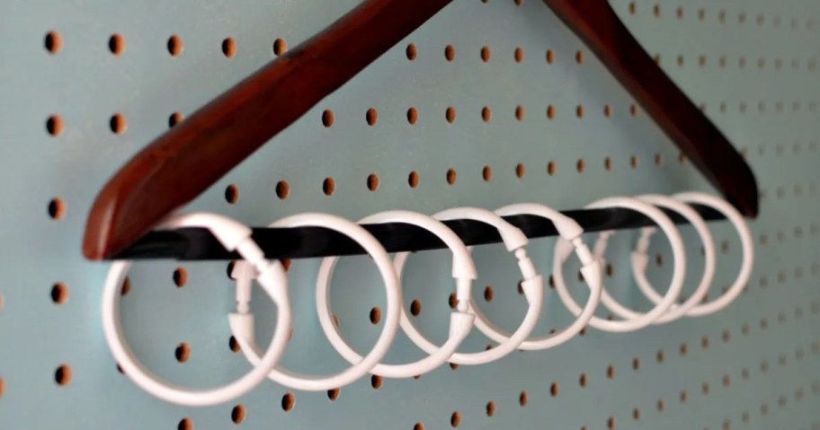 wood hanger with white rings
