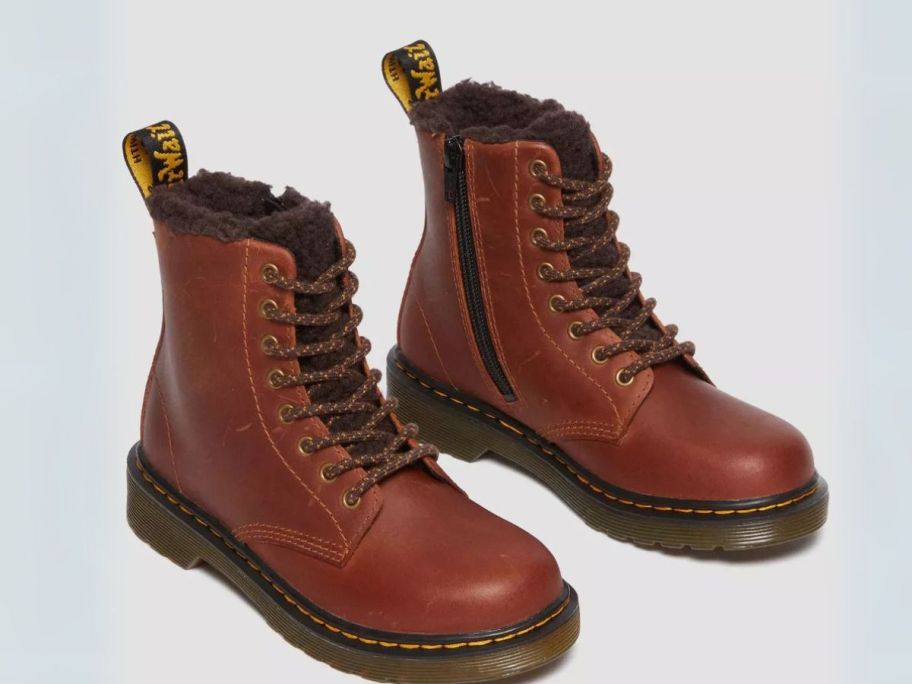 brown Dr. Martens Junior 1460 Faux Fur Lined Boot stock image