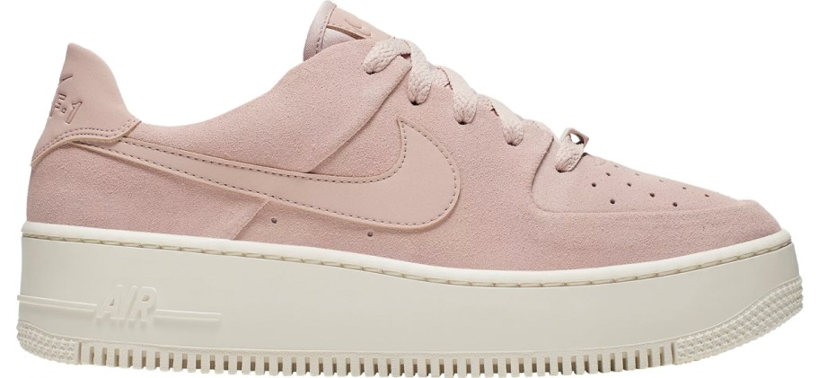 pink and white nike shoe