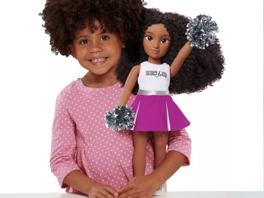 girl holding HBCyoU Cheer Captain Doll Alyssa