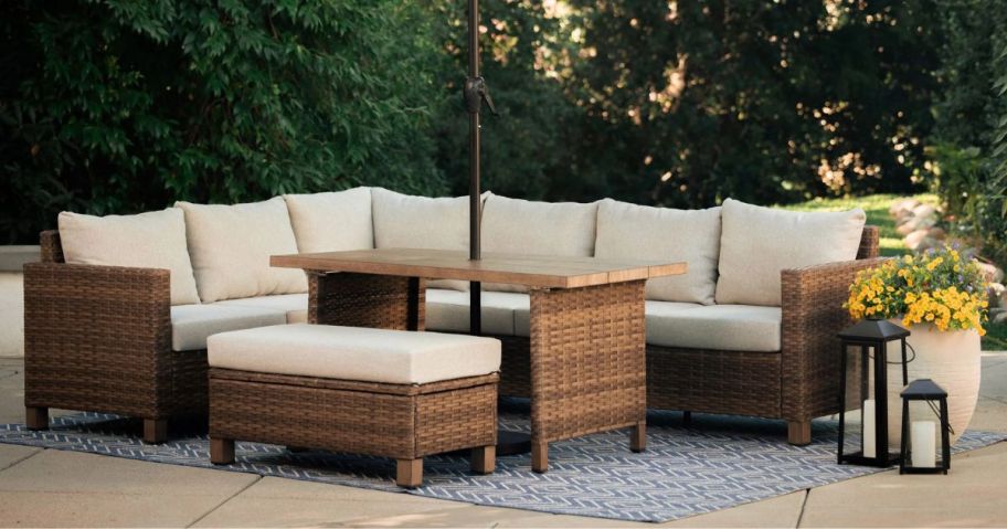 Better Homes & Gardens Brookbury 4-Piece Outdoor Wicker Patio Sectional Dining Set on patio