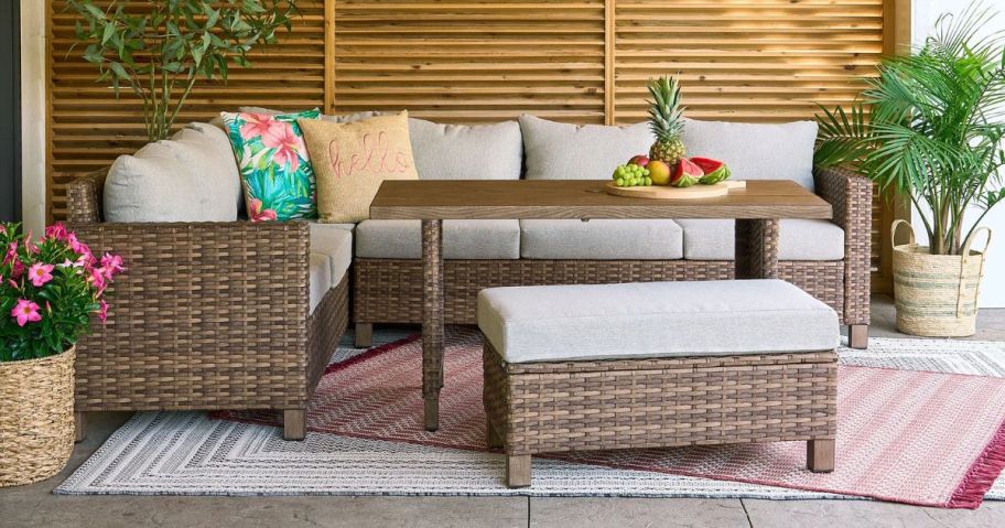 Better Homes & Gardens Brookbury 4-Piece Outdoor Wicker Patio Sectional Dining Set on patio
