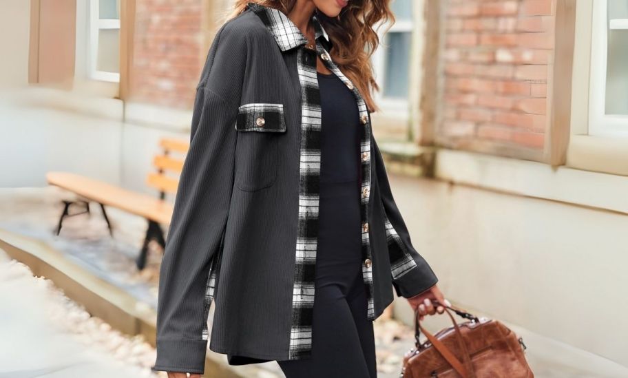 a woman in a gray corduroy. shacket