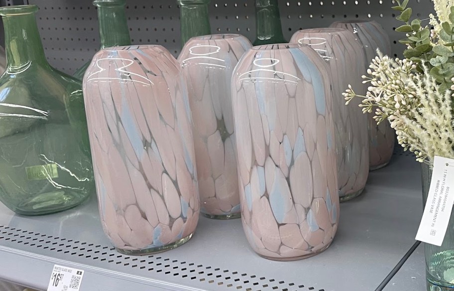 multicolored glass vases on store shelf