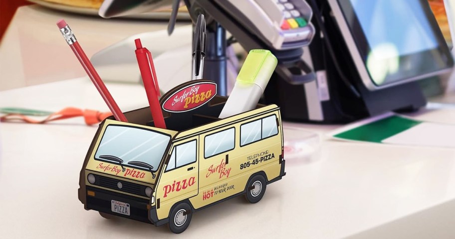 Stranger Things Surfer Boy Pizza pen holder near register